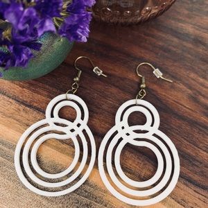 White Figure Eight Earrings